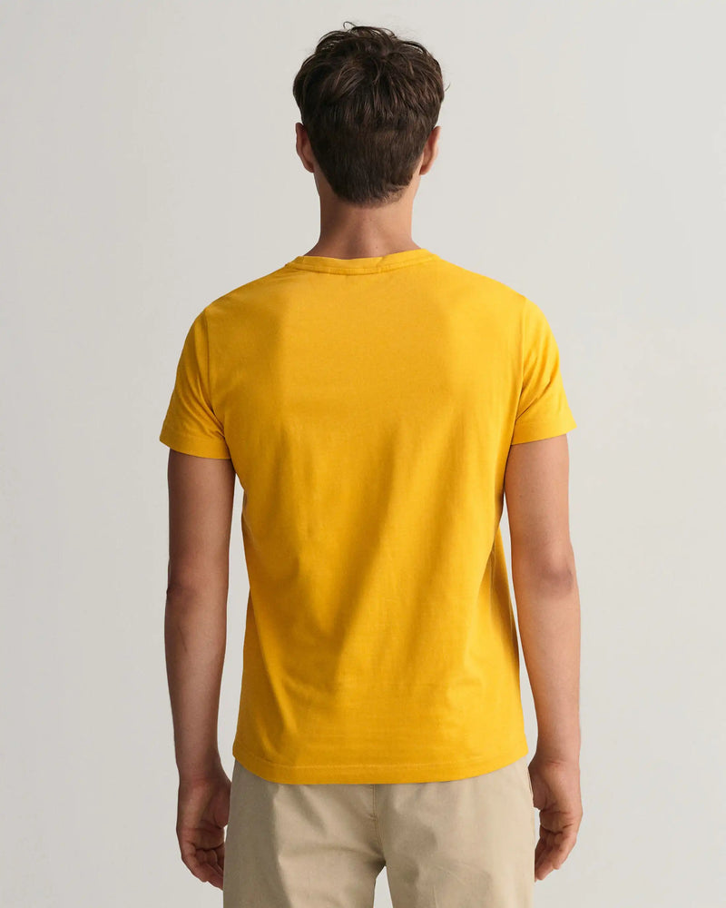 golden yellow shirt